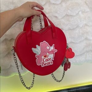 Skinny dip Care Bears Red Crossbody Bag with Playful Design